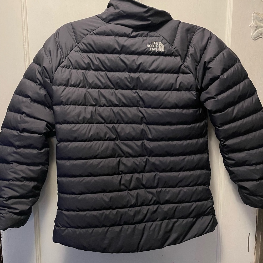 north face puffer jacket, color is black, never worn, size XL/TG